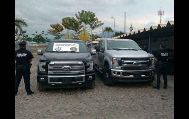 Las tres camionetas recuperadas por los policías federales fueron puestas a disposición del Ministerio Público. ESPECIAL /