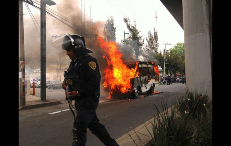 Los aprehendidos incendiaron camiones del transporte público y de volteo. SUN / ARCHIVO