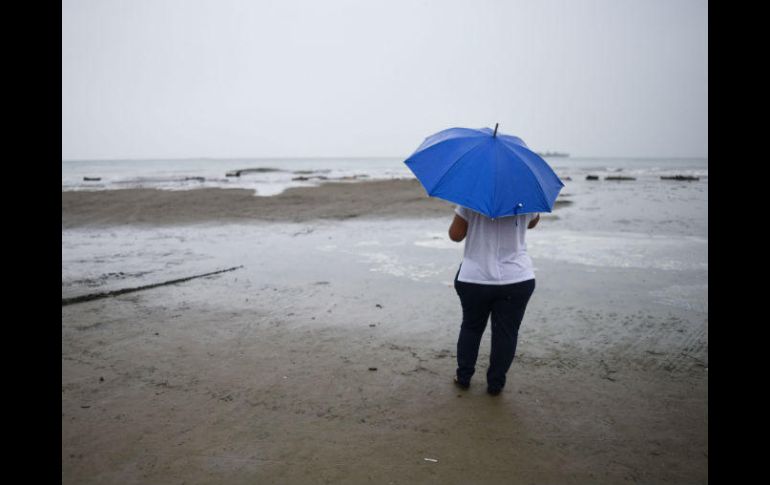El Meteorológico recomendó a la población extremar precauciones por lluvias, viento y oleaje. AFP / V. Razo