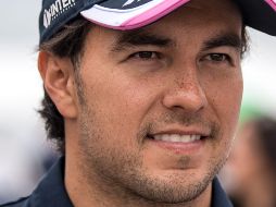 El piloto mexicano Sergio Pérez hizo válido el paquete de actualizaciones en su monoplaza y con ello logró situarse este sábado en el octavo lugar de la clasificación. AFP / A. Isakovic