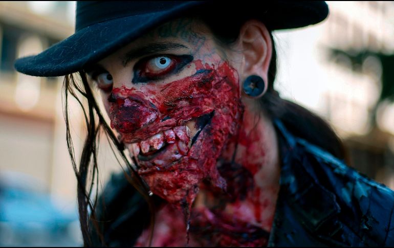 La tradicional reunión de los zombis surgió en 2001 en California (Estados Unidos) y desde entonces se ha expandido a otras ciudades del mundo. AFP / M. Schincariol