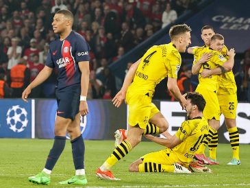 El Dortmund, que marcha quinto en la Bundesliga, se impuso 1-0 en ambos partidos de la eliminatoria tras neutralizar a Kylian Mbappé. EFE/ C. PETIT TESSON